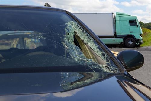 A windshield of a car with a broken windshield

AI-generated content may be incorrect.